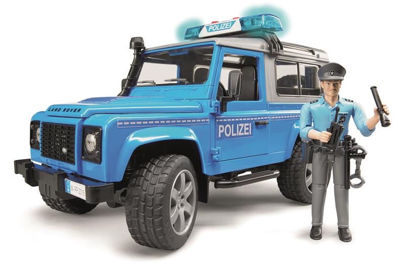 Bruder 2597 Policejní Land Rover Defender s policistou
